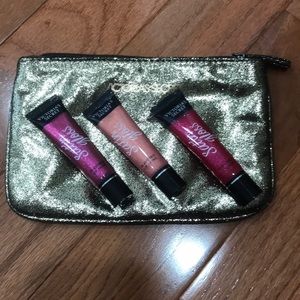 3 Victoria secret satin glosses and make up bag